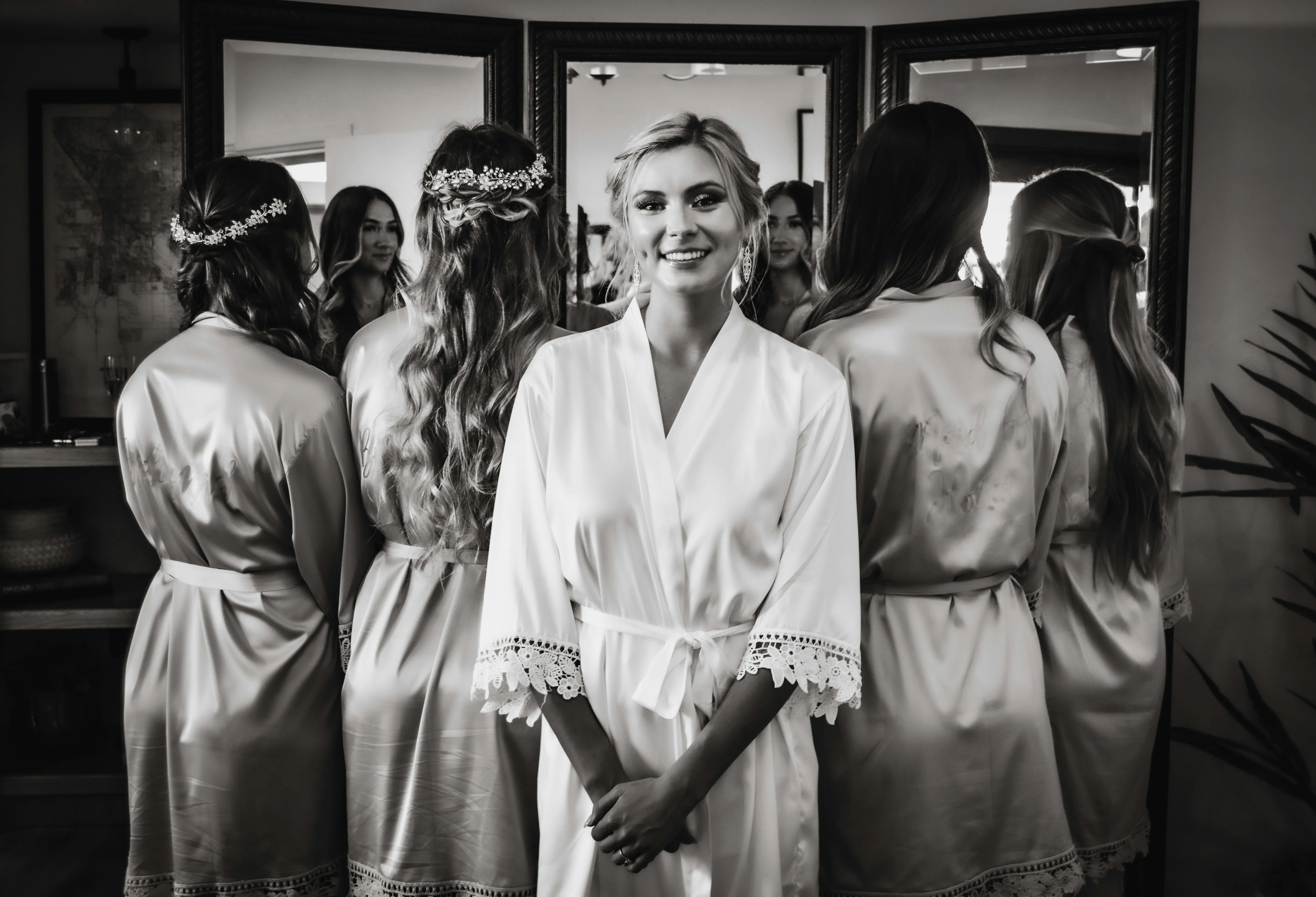 Bride and bridesmaids in robes with trial bridal hair styled, at Characters Hair Randwick