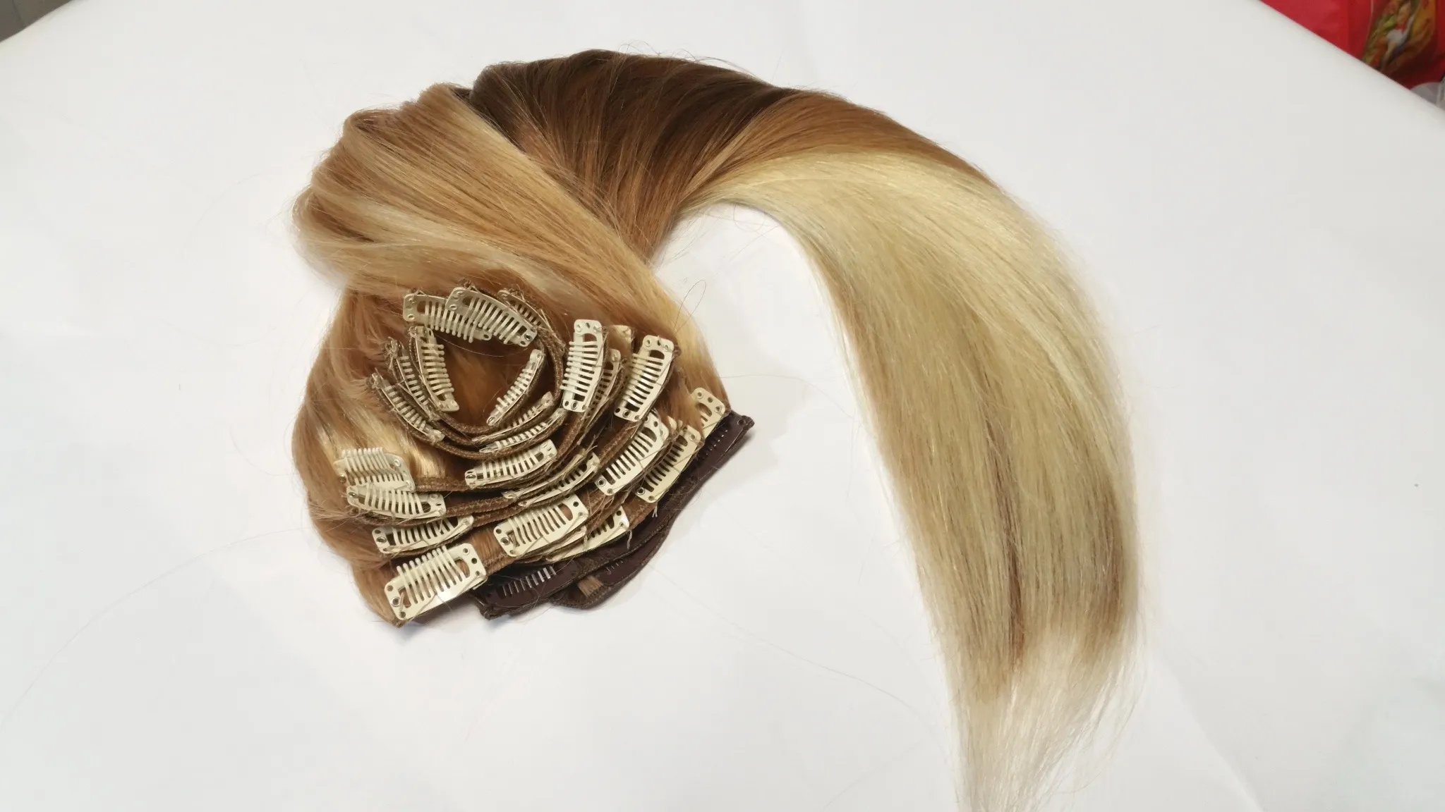 Set of blonde balayage clip-in hair extension wefts with clips, colour-matched at Characters Hair, Randwick