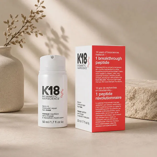 K18 leave-in molecular repair hair mask, used in bond-building treatments at Characters Hair