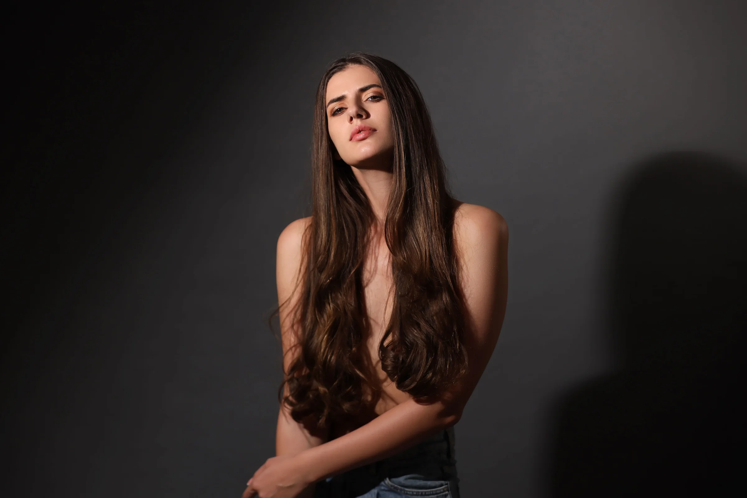 Long, thick brunette waves with added length and volume - hair extensions at Characters Hair Randwick