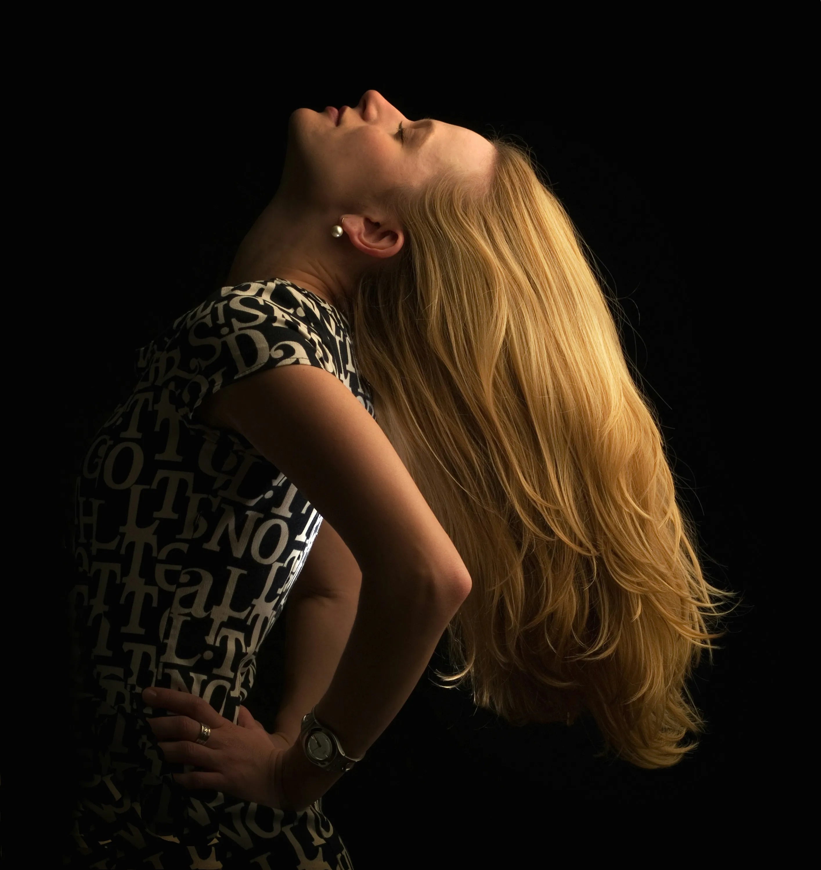 Long golden blonde hair kept glossy between toning appointments - Characters Hair Randwick