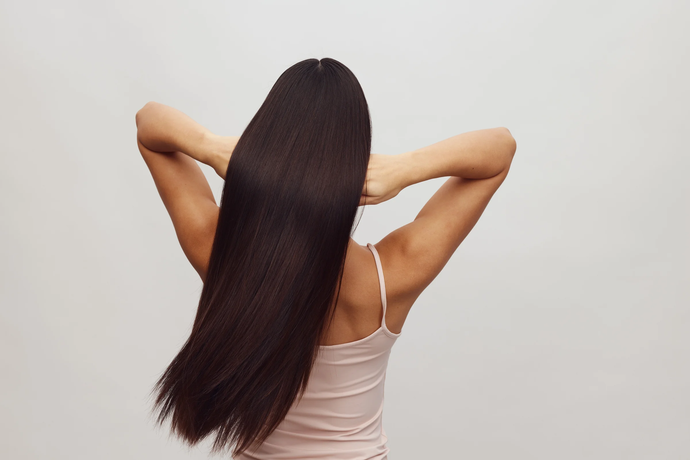 Long, glossy, poker-straight dark hair - nanoplasty and keratin smoothing at Characters Hair Randwick