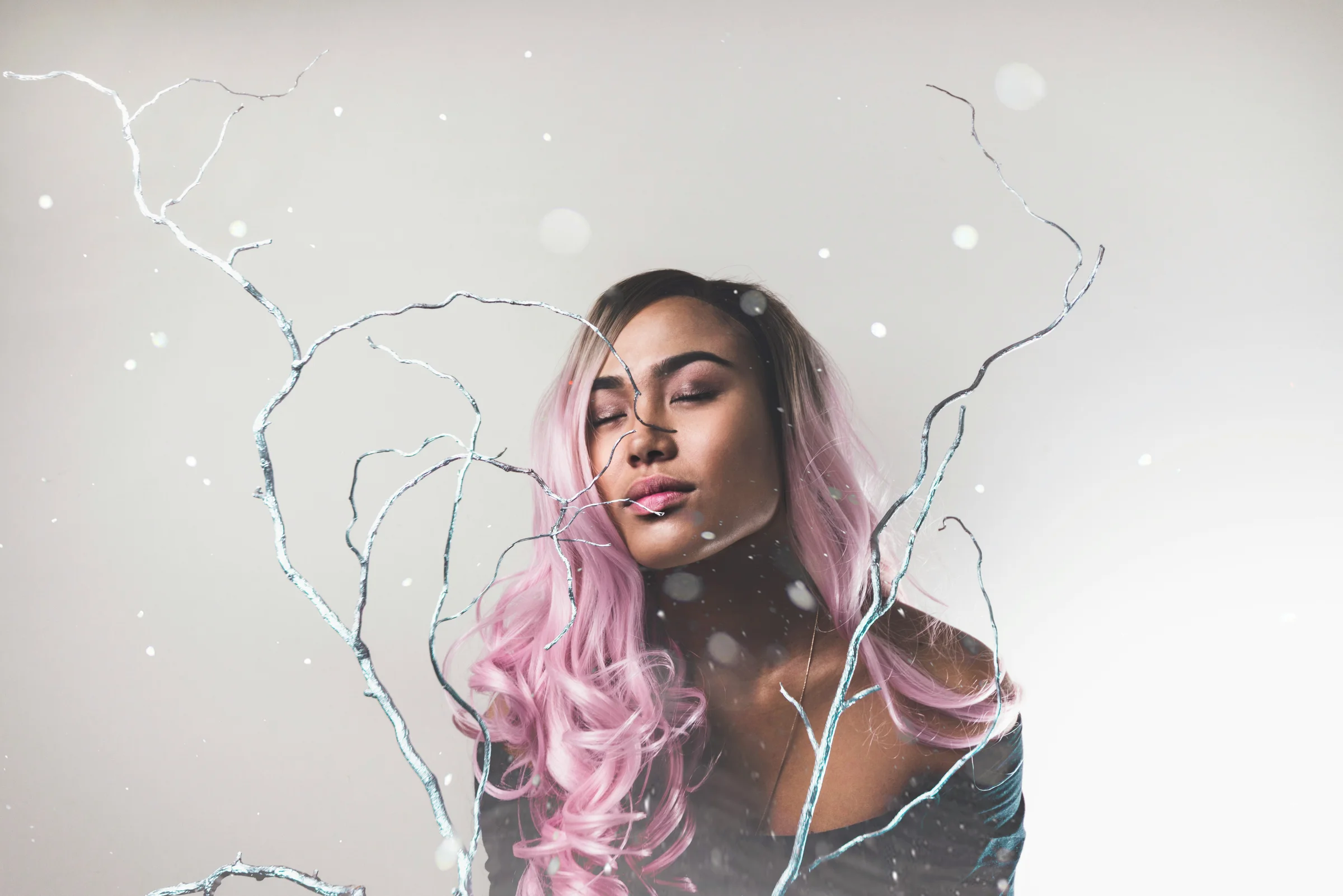 Soft pink creative hair colour on long curls - hair colour specialists at Characters Hair Randwick
