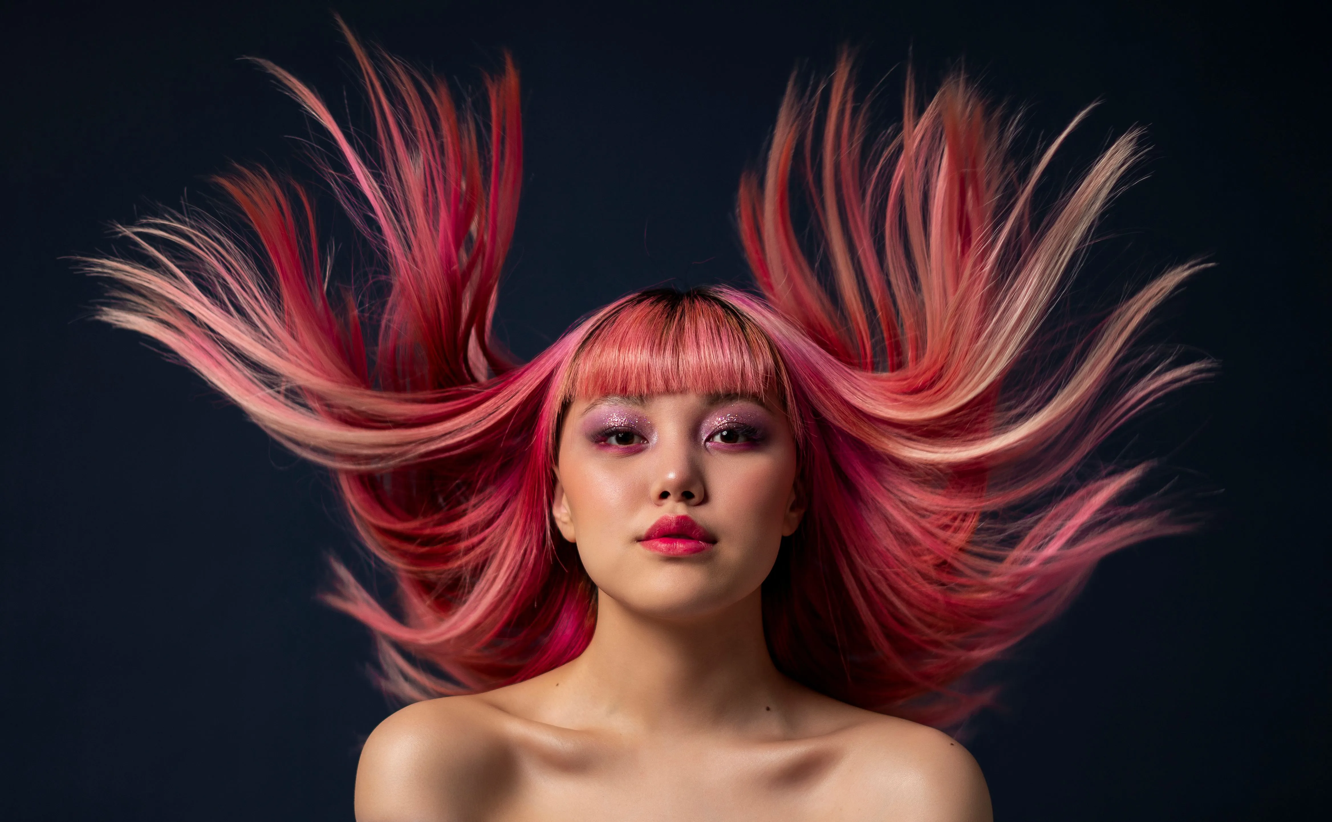 Creative fashion colour in blended pink and rose tones with a fringe, Characters Hair Randwick